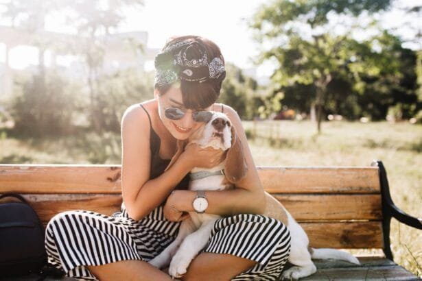 CBD oil feature image - woman hugging dog | Tailwaggors